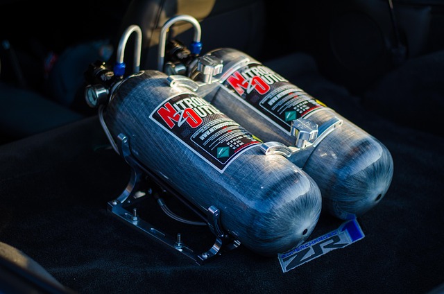 Sleek black sports car parked in a minimalist garage, emphasizing its powerful stance and Gear Flux's premium selection.